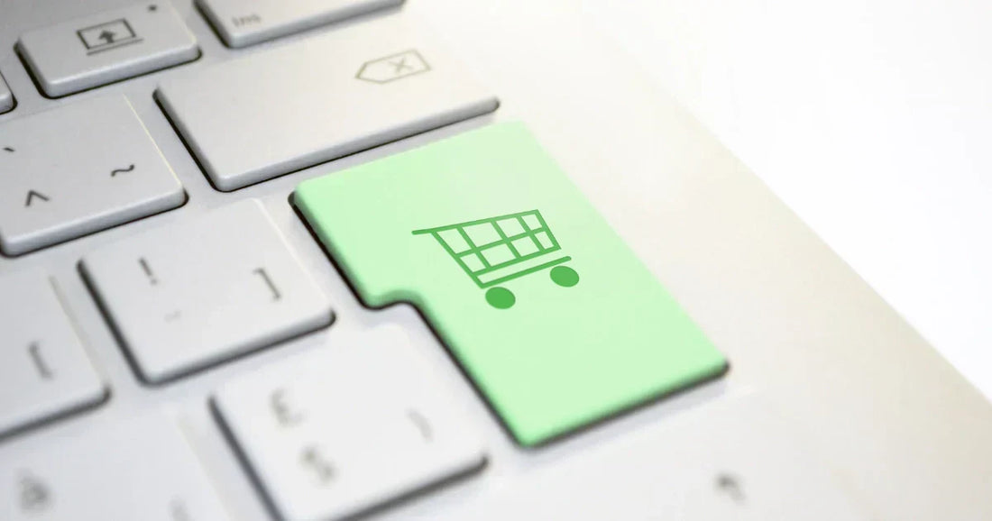 Abo-Checkouts rechtssicher: Grüne Tastatur-Taste mit Einkaufswagen-Symbol.